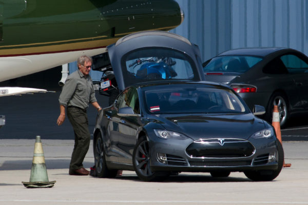 Exclusive__Harrison Ford is a green person, he is driving a Tesla, 100% electric, and private green jet and other green color aircraft... today Harrison Ford take off to St, John International Airport in Canada after a stop to Green Bay.